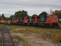 CN 394 rolls by the yard at Brantford with a four unit consist including BCOL 4618 which has been repainted into  CN colours.