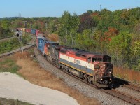 A BC Rail C40-8M and an exATSF C40-8W lead CN train 332 down the Niagara Escarpment.