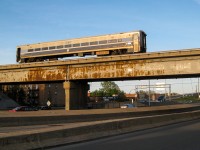 AMT 734 is stopped on the CP bridge over highway 20 for an unknown reason (it may have been just released from nearby Canadian Allied Diesel). Not too long after this photo was taken, an eclectic lashup made up of CP 3024, CP 3120, CEFX 1033 & CP 8751 would couple up and push the car eastwards. These 700 series cars would be taken out of service in the summer of 2010 when AMT received a large order of Bombardier multilevel cars. Since then these 700 series cars have been refurbished and repainted and are expected to reenter service any day now. For more train photos, check out http://www.flickr.com/photos/mtlwestrailfan/