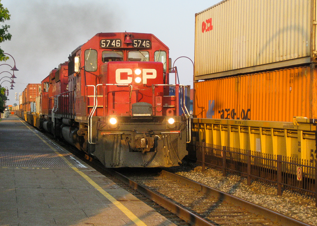 Double SD40-2's. CP 5746 & CP 5790 head west through Dorval at sunset after holding for two eastbounds. For more train photos, check out http://www.flickr.com/photos/mtlwestrailfan/