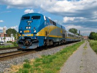 A ragged looking VIA 900 is in charge of 4 LRC cars as it heads west through the St-Henri neighbourhood of Montreal. For more train photos, check out http://www.flickr.com/photos/mtlwestrailfan/