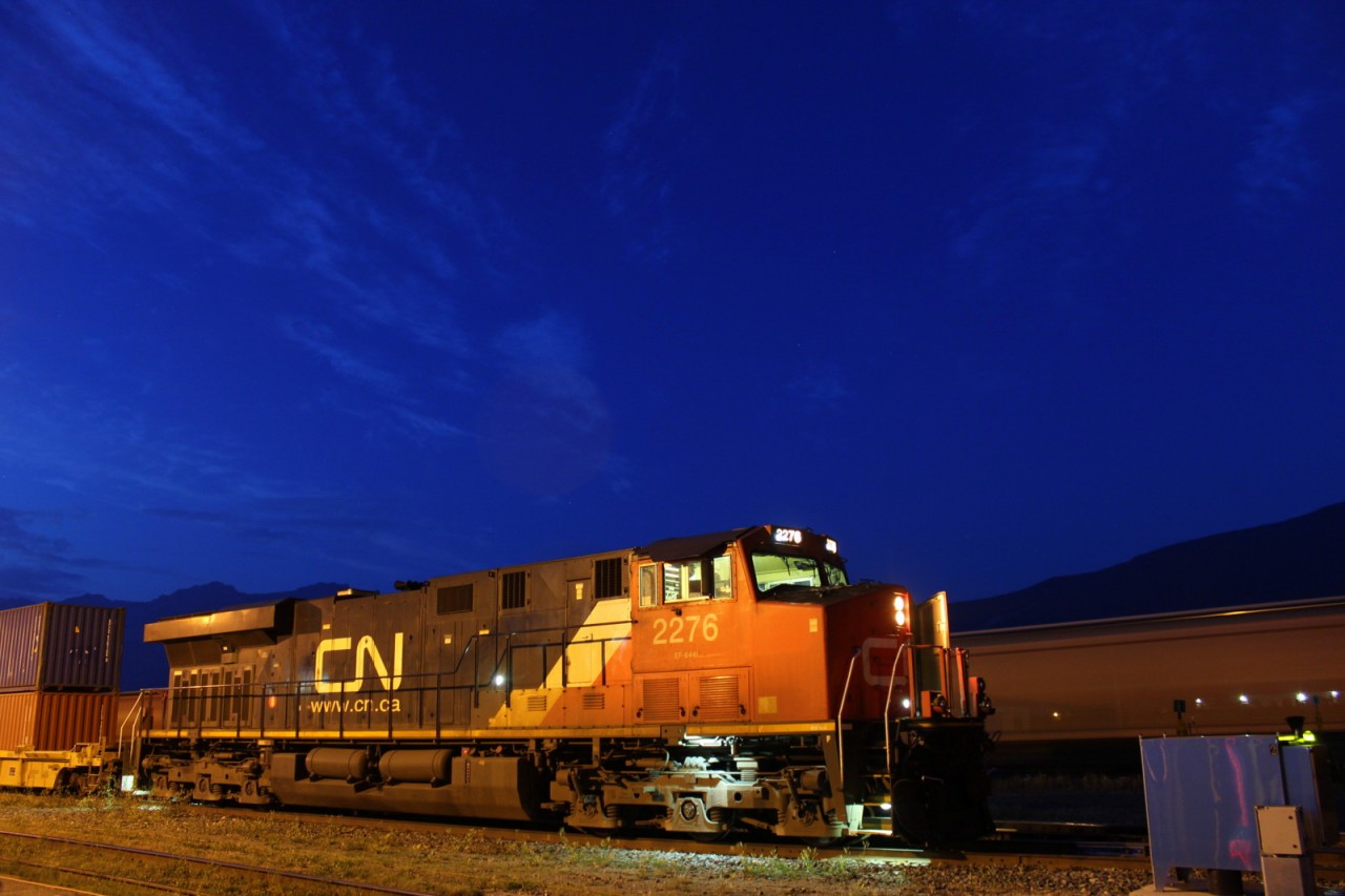 CN 2276 gets a fresh crew and waits for another train to clear the main