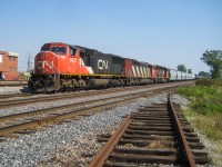 An all-GMD consist of CN 5627, CN 5550 & CN 5299 lead a westbound through Dorval. The unused track in the foreground has since been removed. For more train photos, check out http://www.flickr.com/photos/mtlwestrailfan/