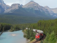 An empty grain train heads east through the famous Morant's curve.