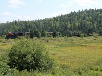 CN 573 approaching Hawk Jct passing through a meadow