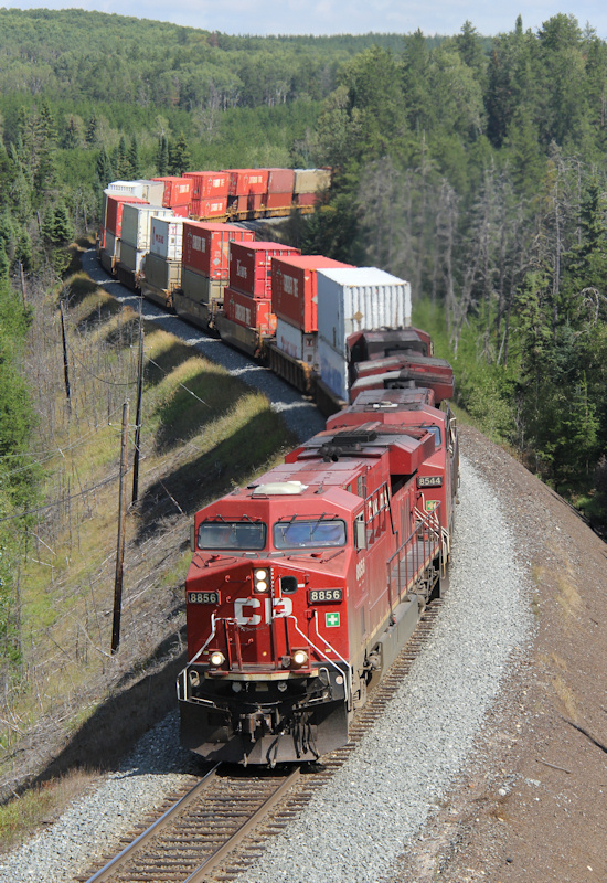CP 101-27 heads towards White River with 156 platforms behind
