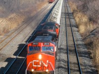 CN 2572 smokes it up as it leads a TankTrain west through Lachine, on its way towards the refineries of East End Montreal. Trailing unit is CN 5634. These trains, which ran from an Ultramar refinery in St-Romuald (near Quebec City) to Montreal have since been replaced by a pipeline. For more train photos, check out http://www.flickr.com/photos/mtlwestrailfan/