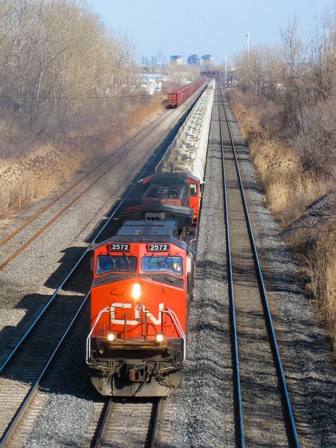 CN 2572 smokes it up as it leads a TankTrain west through Lachine, on its way towards the refineries of East End Montreal. Trailing unit is CN 5634. These trains, which ran from an Ultramar refinery in St-Romuald (near Quebec City) to Montreal have since been replaced by a pipeline. For more train photos, check out http://www.flickr.com/photos/mtlwestrailfan/