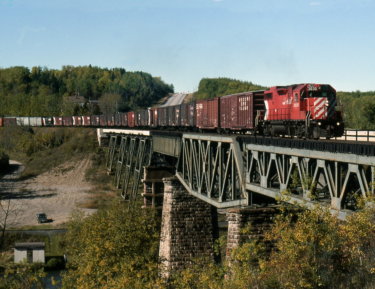 CP's Red Rock Switcher heads home to Schreiber crossing the Nipigon River and CN's Kinghorn Subdivision just east of Nipigon station.