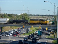 A long day of switching completed, 580 is zipping over the rush-hour Highway 6 (Hanlon Expressway) traffic in Guelph, Ontario headed back to Kitchener.