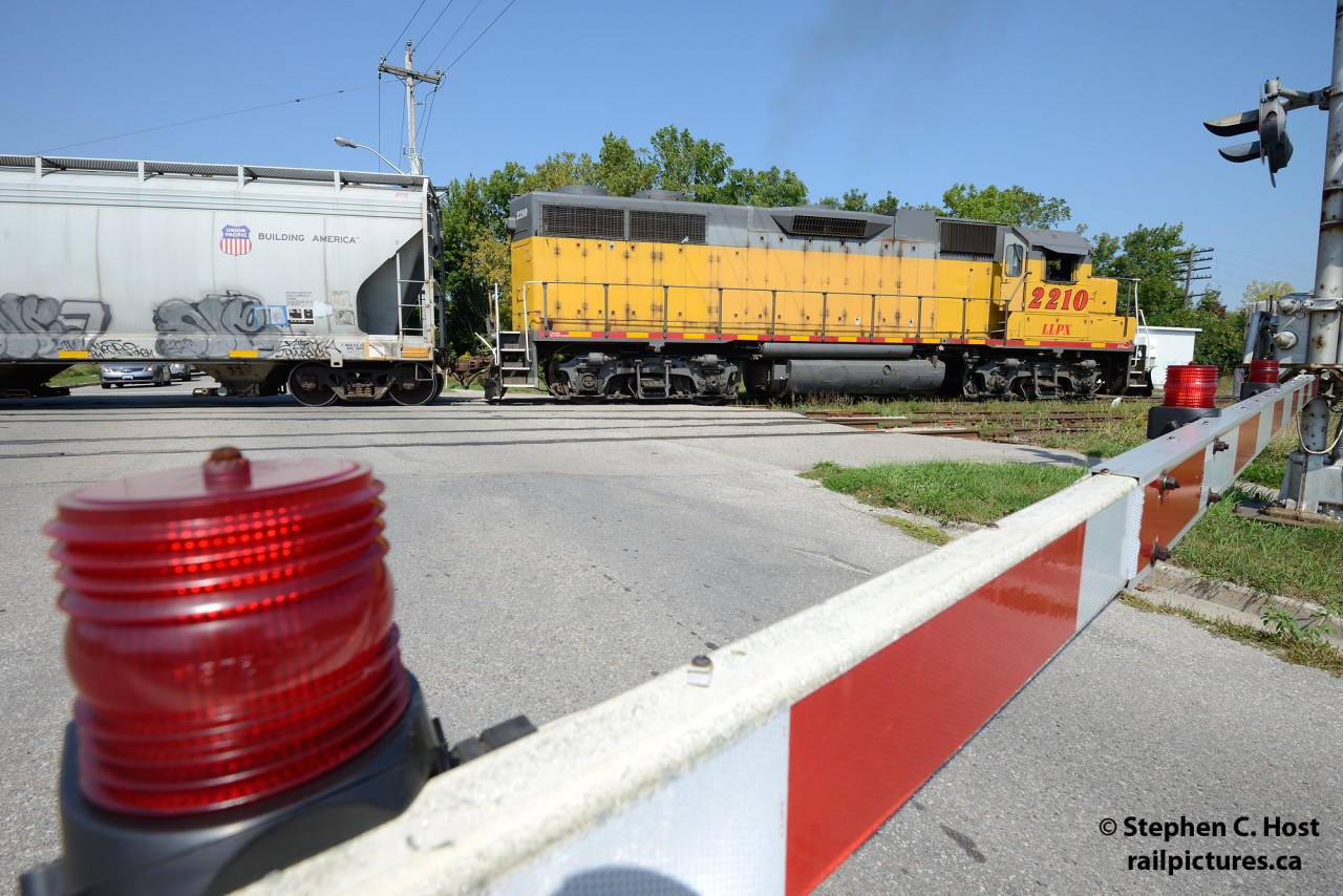 At Guelph, Ontario, LLPX 2210, train 580 is switching the yard in Guelph prior to heading north.
