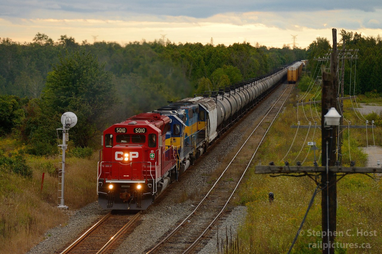 As light rapidly fades away and I pump the ISO higher, CP 642 is accelerating out of Puslinch after having just got a clearance from Puslinch Siding to Guelph Junction. CP train 241, 9670 west was the item 4.