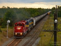 As light rapidly fades away and I pump the ISO higher, CP 642 is accelerating out of Puslinch after having just got a clearance from Puslinch Siding to Guelph Junction. CP train 241, 9670 west was the item 4.