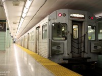 It's a quarter to 10 at night, and the rush hour crowds have thinned out considerably. A well-worn TTC H5, 5770, trails a southbound train sitting on the upper platforms of St. George Subway Station, ready to head south down the University line to Union and beyond. With only a year and change left, the clock was ticking down not just for the end of the day, but the end of the fleet of ~140 1970's yellow-doored H5 subway cars, which were still easy to find at the time. Today there are none, replaced by shiny new <a href=http://www.railpictures.ca/?attachment_id=328><b>Toronto Rockets</b></a> and ho-hum <a href=http://www.railpictures.ca/?attachment_id=1797><b>T1 cars</b></a>.