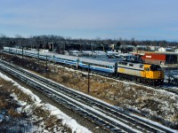 Leased VIA 6452 leads AMT train 14 into Beaconsfield.