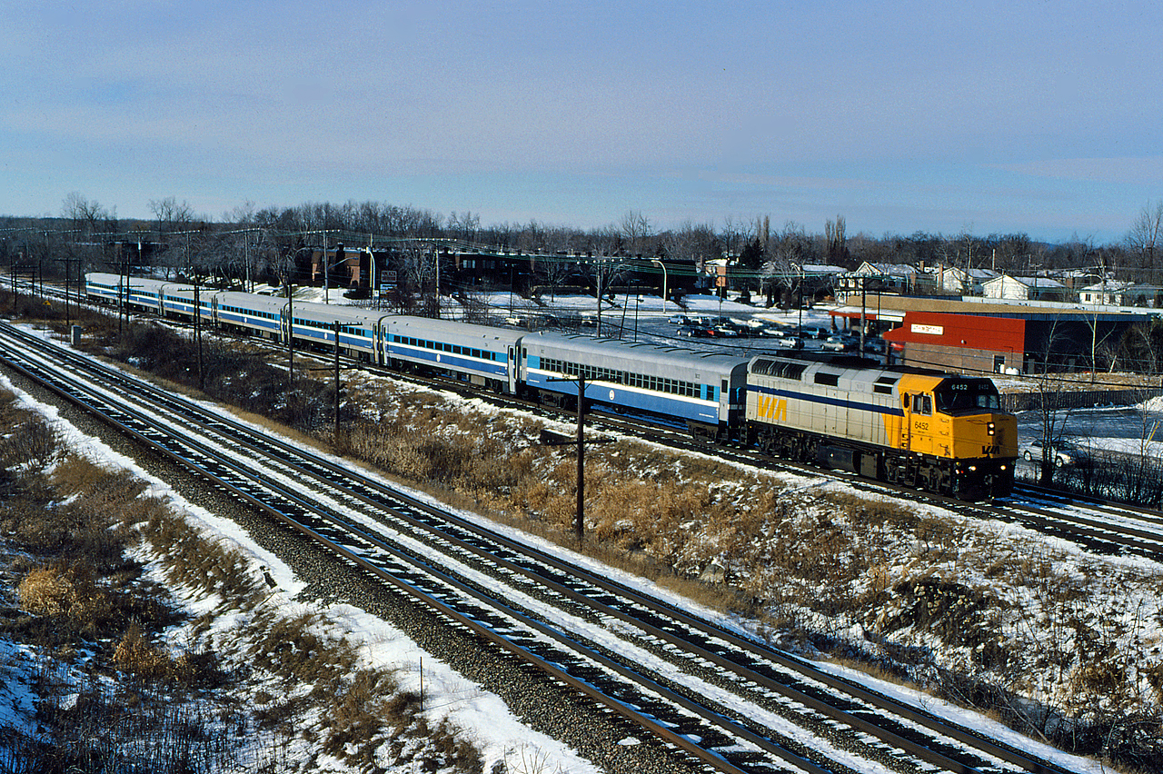 Leased VIA 6452 leads AMT train 14 into Beaconsfield.