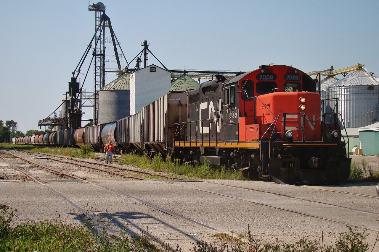 CN 7069 was busy this day switching cars at the ADM and Thompson & Sons Elevators in Blenheim. These are former LE&DRR/PM/CO/CSX tracks and CN took control during March 2006.