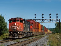 Passing through my old childhood stomping grounds, CN Q149 speeds through Clarke on the north track of CN's Kingston Sub behind a nice SD50AF.