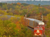 Trains 246 heads down the Niagara Escarpment into Hamilton on a crisp October morning. With no work for Steelcare at Aberdeen the crew will head straight for Kinnear, a crew change and a lift before heading to Welland for more work.