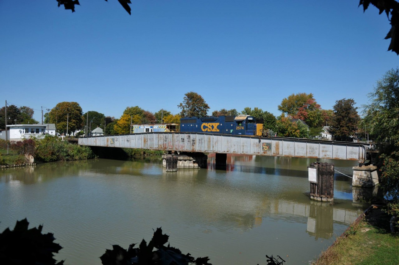 CSX Southwestern Ontario districts last mainline run on the original subdivision two (Sarnia Sub) to Wallaceburg. The line has been around and in use since the early 1900's by Pere Marquette followed by the take over of C&O and finally CSX. Seen here at the Wallaceburg Bridge is the last run from Sarnia to Wallaceburg and return on the OCS/ABS Sarnia Sub mainline with CSX GP38-2 #2574 as the power followed by CSX Caboose (shoving platform) #900074. Due to a derailment the day before and no way to run around the train here at Wallaceburg the crew was forced to bring along the caboose to use as a shoving platform. This topped off the last train like no other, mainline service with a caboose in 2013! Railfans, employees and fellow friends were out in numbers for this sad but special occasion with a solid goodbye to the line and employees who worked it. Many friends and people who worked the line are now without their jobs. A sad day indeed and a end of an era for the C&O er CSX here in Southwestern Ontario!