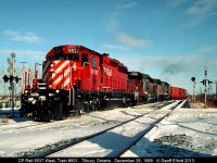 CP 5537 leads train #501, with a pair of SOO SD40-2's for good measure, into the siding in Tilbury on Boxing Day 1989.