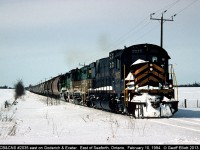 After what seemed like forever standing in the cold CB&CNS #2035 east has finished it's work in Seaforth and is trudging through the snow on it's way to Stratford.  