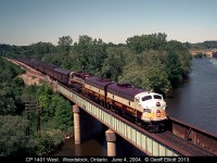 CP FP9A #1401 leads the westbound "Business Train" over the Thames River just north of Woodstock on June 4, 2004.  The next day, on the return trip, we'd chase this guy from Windsor to Guelph.  Hope they bring this train back down the Galt and Windsor subs again someday.