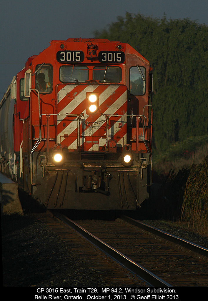 T29 has CP 3015, with classic candy stripes, on the point as it races across Belle River at MP 94.2 on the Windsor Subdivision.  Not exactly what I was hoping for in the shot, but it's hard to go wrong in this day and age if you have candy stripes on the nose......