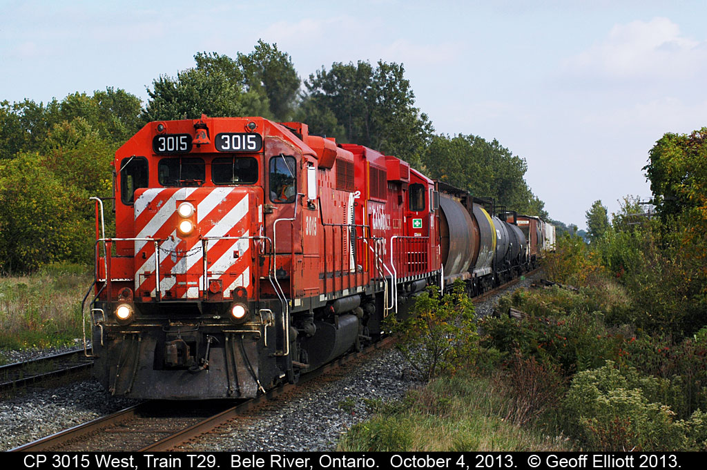 CP 3015 is racing for the finish line in Windsor with the westbound T29 after a long day of switching in the Chatham area.
