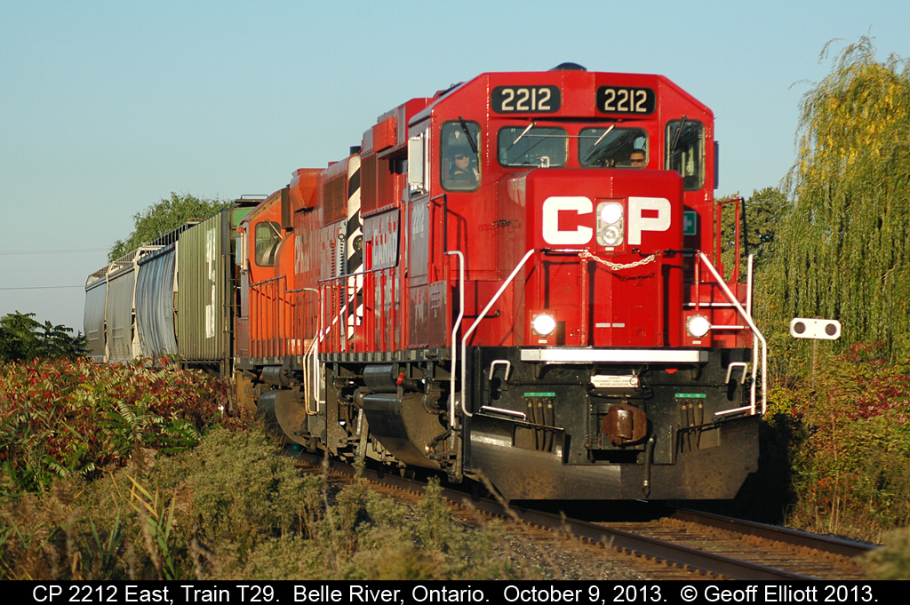 CP GP20C-ECO #2212, with CP 3015 in tow, has it's 4 hoppers rolling over Belle River at MP 94.2 on the Windsor Subdivision as they speed toward Chatham to do their regular weekday duties.