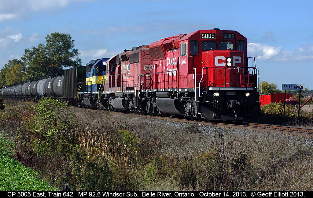 CP SD30C-ECO #5005 leads loaded ethanol train #642 past the easterly "Belle River" mile-board on a beautiful Canadian Thanksgiving Day.