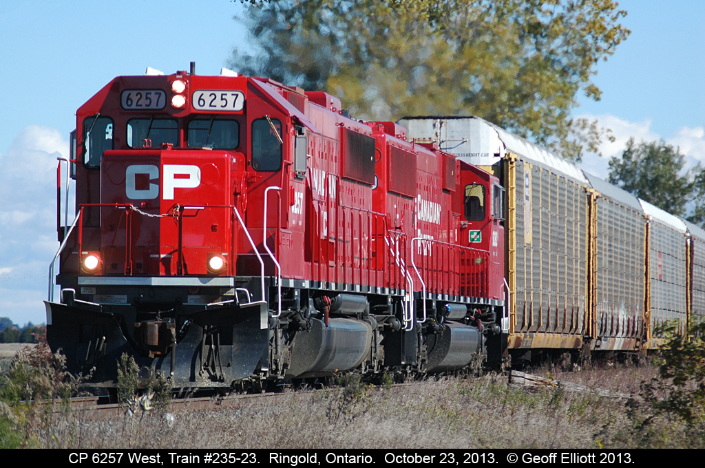 Grab shot of the day.....  CP 6257 and 6262 lead train 235-23 just west of the town of "Ringold" on the Windsor sub.  I had no idea this guy was coming and just caught a glimpse of the headlight in the distance otherwise this would have been a missed opportunity.  Wish I could have made it to a better location but I did not have the time to do so.  Hope you like what I did get.