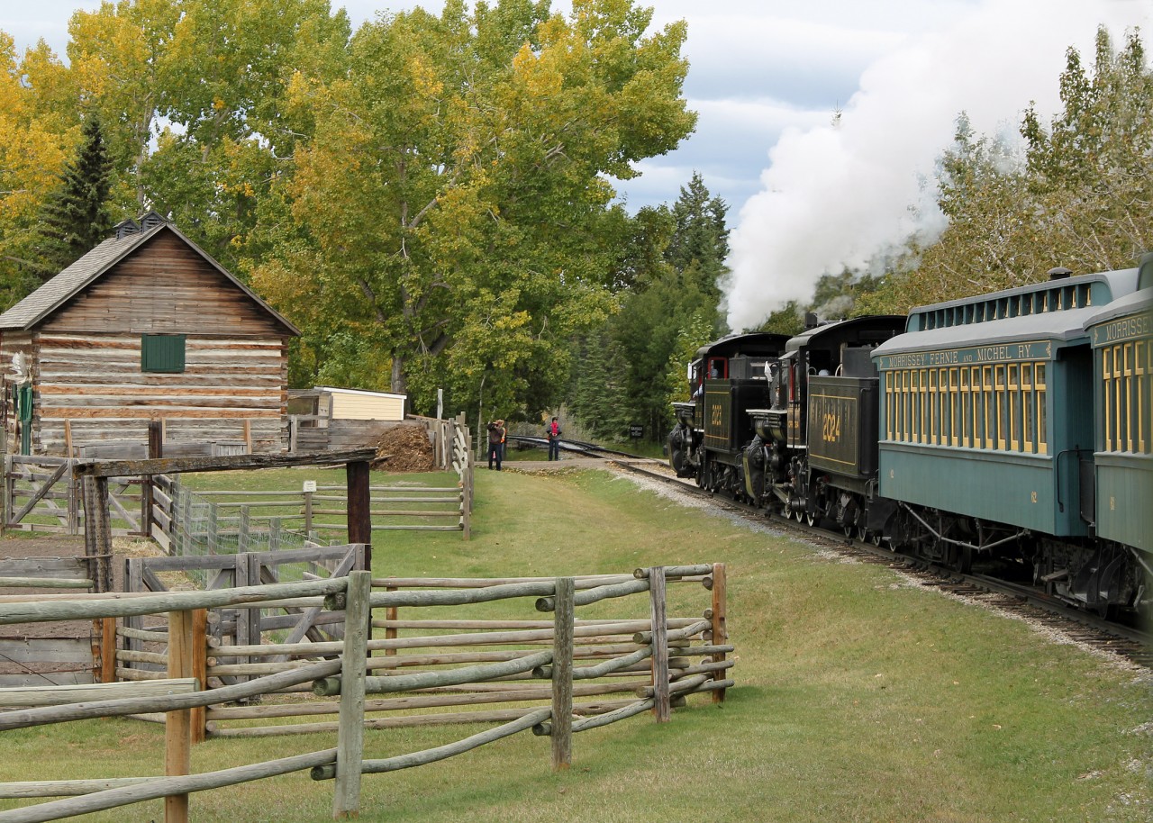 Riding the train at Railway Days.  Passing one of the heritage homestead farm exhibits.  The train is double headed by ALCO CP2023 and Lima CP2024, both ex US Army locos.