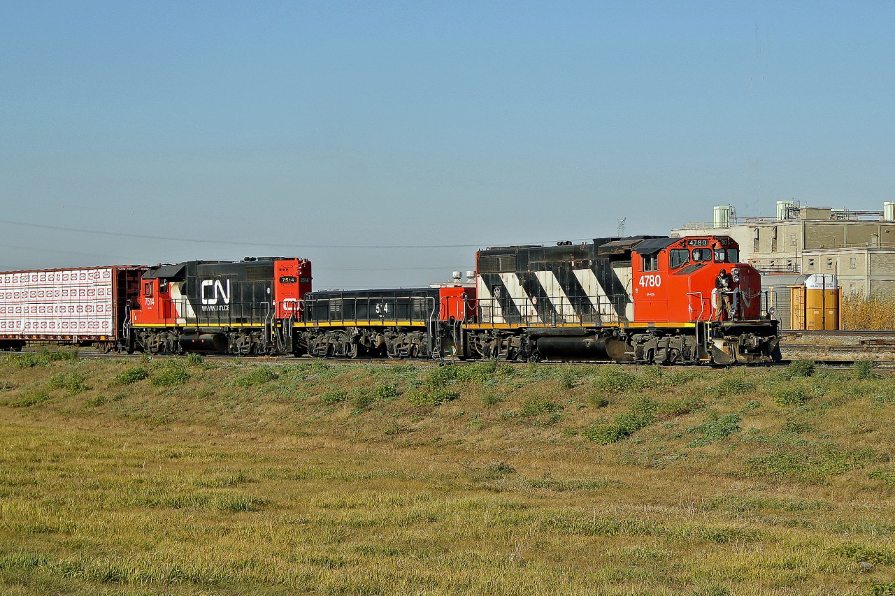 GP38-2(W) CN 4780 with GP38-2 7514 and HBU 514 switch cars at the east end of CN's Clover Bar Yard