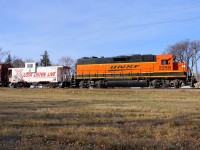 BNSF 2258 heads north along CP's La Riviere Sub with interchange traffic for CP.