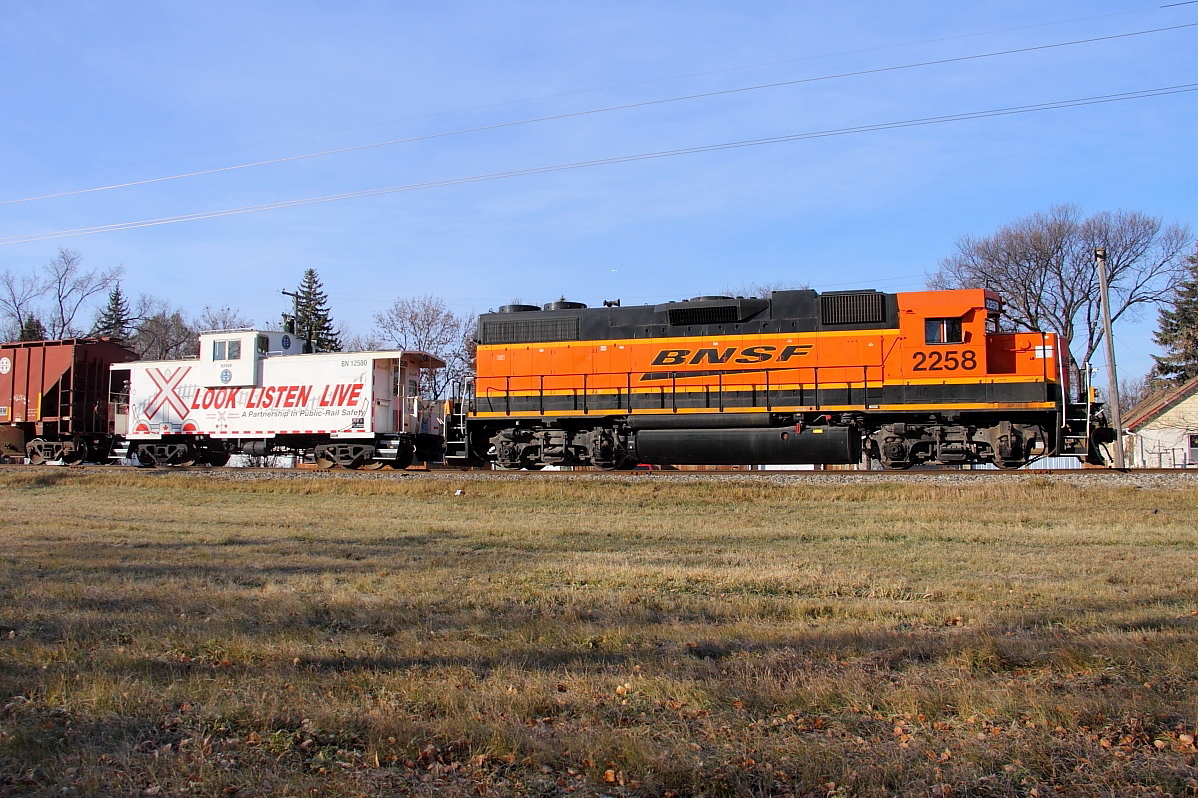 BNSF 2258 heads north along CP's La Riviere Sub with interchange traffic for CP.