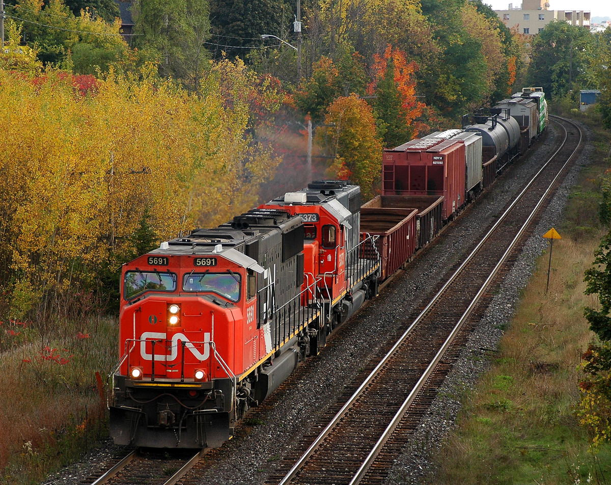 435 departing Brantford with CN 5691 - CN 5373 and 13 cars (after dropping 12 cars and lifting 2 in the yard)