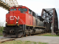 CN 8013 is on point leading CN 551 into Canada.