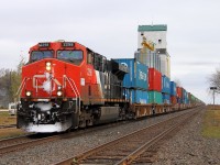 CN 2298 sporting a bit of snow leads Q101 through Oakville.