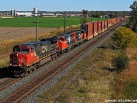 Every so often CN 149 has some interesting treats up front. The leader is a bit ho-hum, but the trailing units are worthy of a chase. CN 2629, 9639, 4785. 1238hrs.