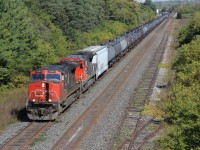 CN 331 with CN 2580 and CN 2118 charges westward out of Ingersoll towards London.