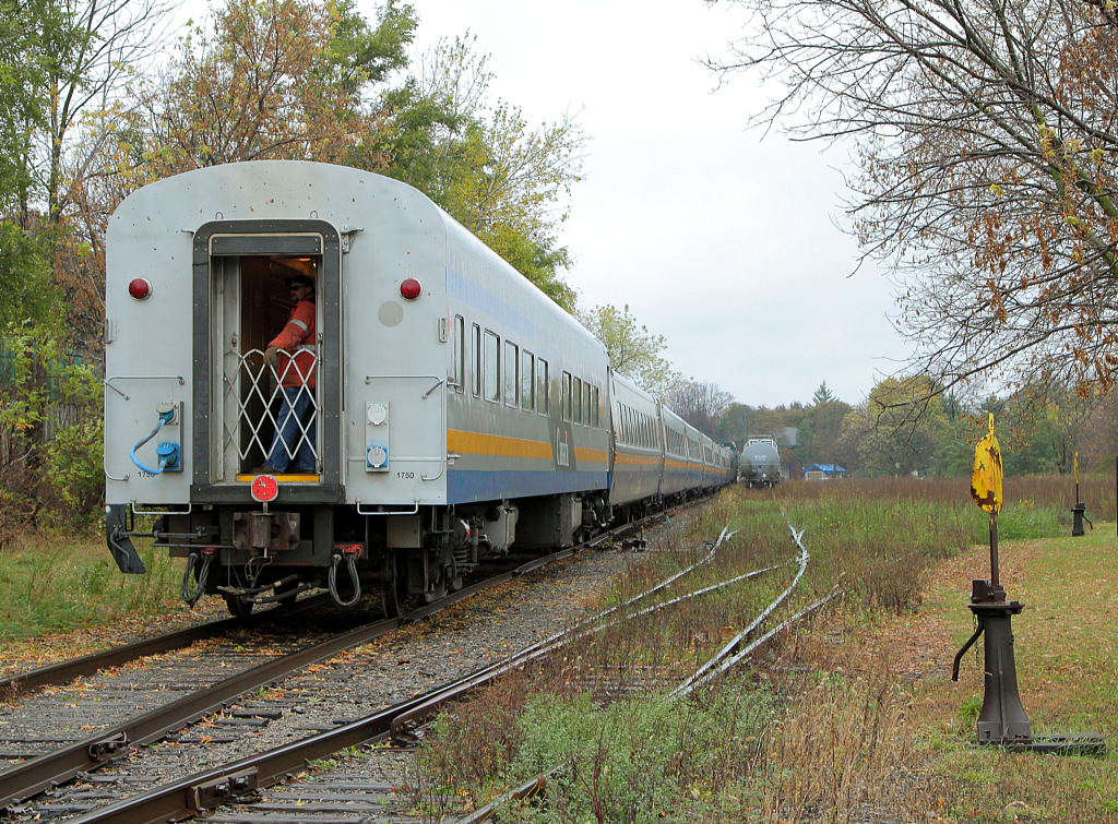 Some rare VIA mileage when VIA 669 wyed it's train on the Guelph N Spur at Guelph. VIA 669, was a special train run from Montreal to Guelph. It had Alouettes fans onboard coming to watch their team play against the Hamilton Tiger-Cats, who has Guleph as their temporary home stadium.