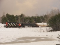 A later than usual CN 595 - Work 4136 North highballs past Bracebridge and Muskoka Lakes Secondary School (BMLSS as it's known) on it's way home to Huntsville under a fantastic evening scene. 