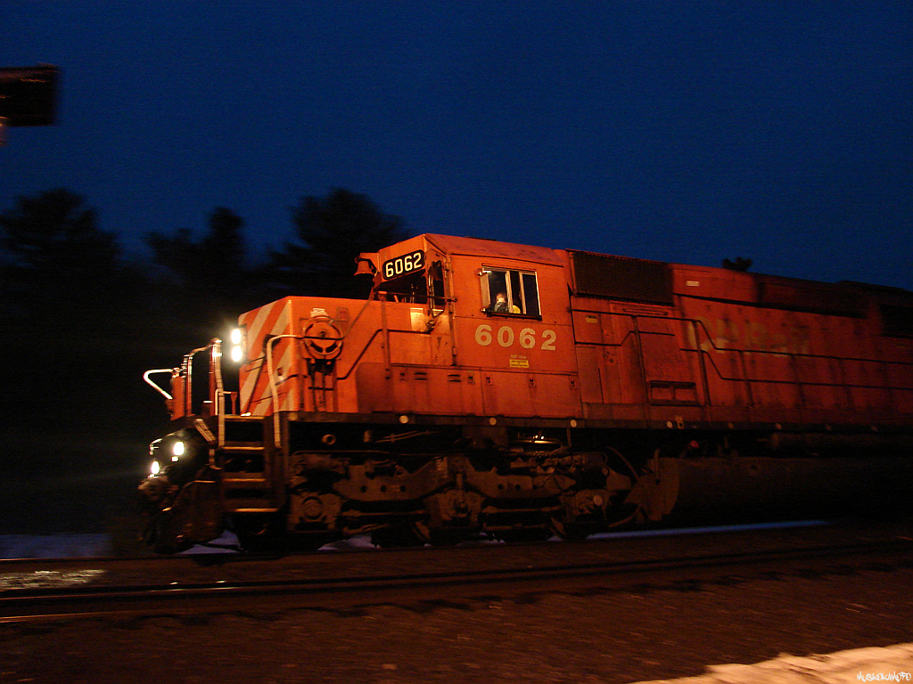 CP 6062 South at CN South Parry copying their clearance from the CP Parry Sound sub RTC in Calgary to proceed from Signal 193 Dockmure to North Yard Switch MacTier where they will duck into the yard for a change off with the Toronto crew. The CN RTC in Toronto has lit them up, as soon as they receive the complete time on their CP clearance, they'll knock down their Diverging to clear signal from CN's Bala sub to proceed through the crossovers at Boyne and back onto CP's Parry Sound sub for the final 20 miles to MacTier.