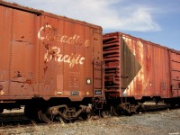 Years ago before the Trudeau hoppers dominated the Canadian railscape, our railways depended on 40 ft boxcars to transport grain from the West. In vintage "as was" shape, 2 of these former kings of the roster spend their final days sitting in the RIP track at Cartier during the spring of 2010. 