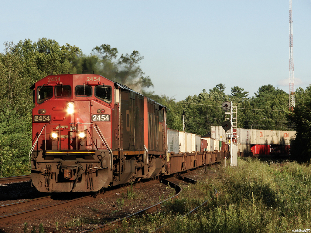 CN Q10721 06 - CN 2454 North hammers the plant at Washago at 18:54 on a beautiful June evening in 2010.