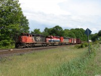 CN 303 - CN 5356 North tied down in the hole at Dock Siding waiting for a Capreol crew to be taxi'd down from South Parry after the Toronto crew ran out of time. BCOL 765 was an Expo '86 unit and although not visible here still shows an "Expo '86" logo on the fuel tank, CN 5457 has since been scrapped as far as I can tell, while CN 5356 is still earning her keep currently in BC at time of submission!