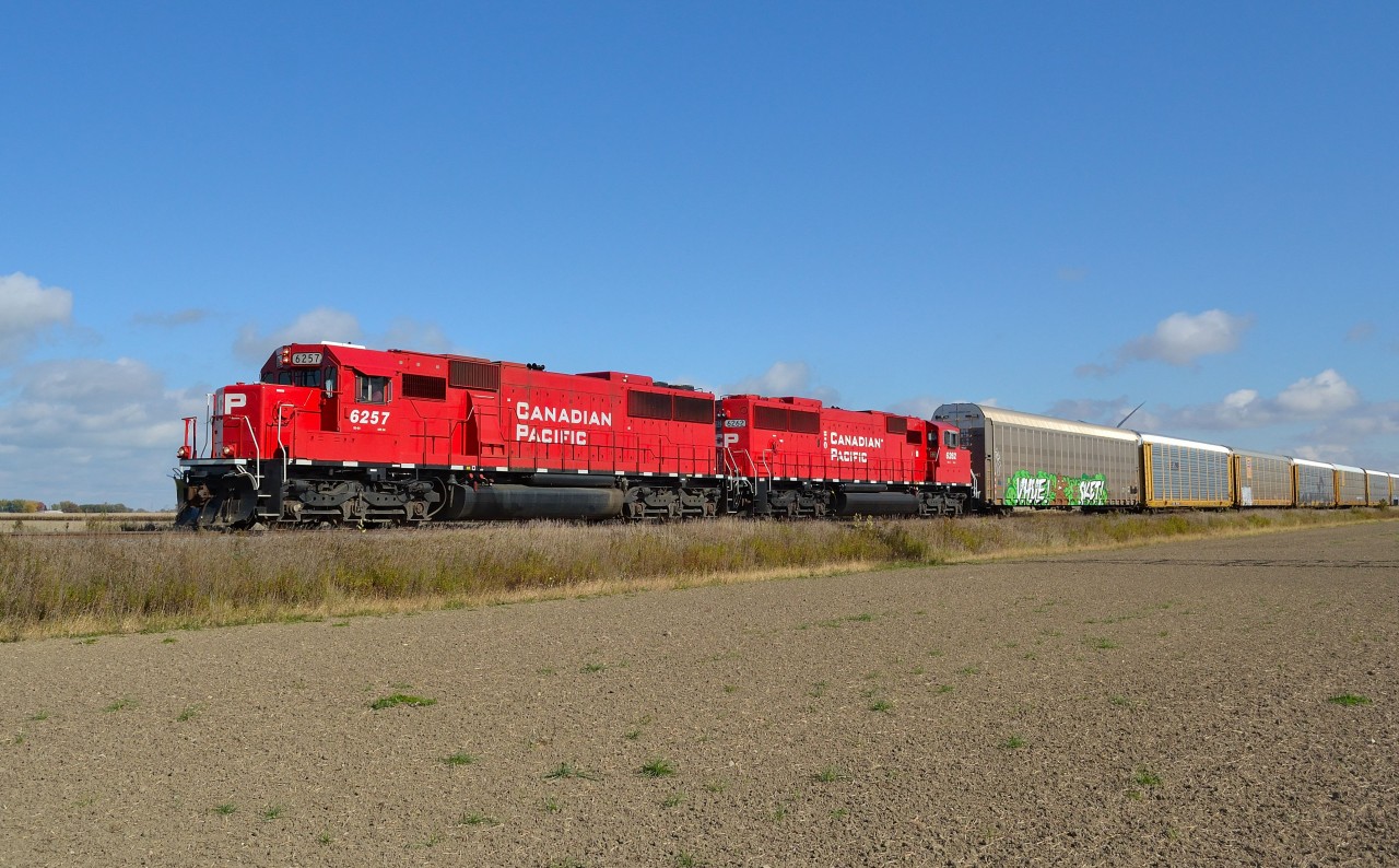 Ex SOO rebuilds 6257 & 6262 lead CP 235 westbound thru Haycroft on its way towards Walkerville.