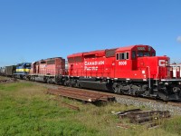 CP 642 led by new SD30C-ECO 5005, passes eastbound thru Tilbury. Trailing units were CP 5907 & DME 6367