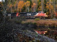 CN 2245 leads a five-unit lashup on CN 368 (trailing are CN 2232, CN 2685, CN 8873 & CN 2323, not all powered) heading north through CN's remote and scenic Lac St-Jean sub. For more train photos, check out http://www.flickr.com/photos/mtlwestrailfan/